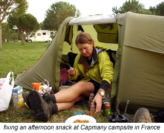 fixing a snack  in Capmany campground in France