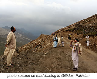 taking photographs on the road to Gittidas, near Babusar Pass, Pakistan