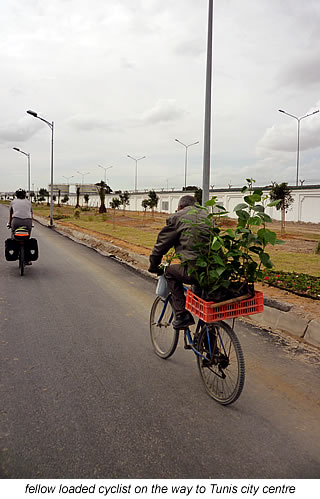 fellow loaded cyclist in tunis